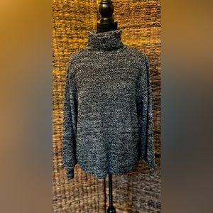 Black marled turtleneck. Sz large. Balloon sleeve.